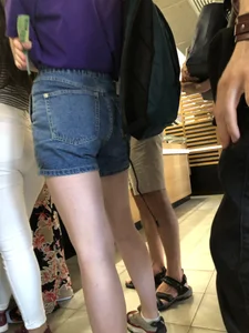 Hot Bare Legs in Blue Denim Shorts Closeup Candid Pics Gallery in the Cafe Line