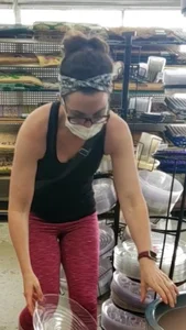 Milf shopping with a nice ass in tight maroon leggings
