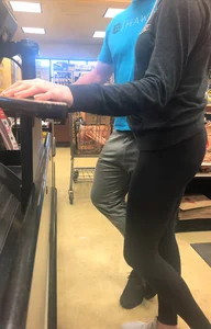 Grocery store girl in line with a nice ass in leggings