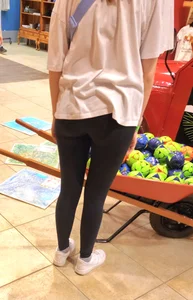 Teen booty in leggings at the store