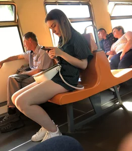 Amazing Hot Girl Sitting in the Train in Shorts Showing Off Her Gorgeous Legs Candid Gallery
