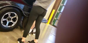 Petite booty looking at boats