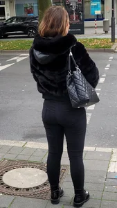Stocky Girl in Tight Pants Standing on Crosswalk Street Creepshot