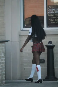 Sexy ebony Tilted Kilt employee in her uniform