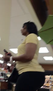 Big booty ebony milf out shopping in tight black leggings