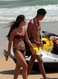 Sexy Asian on the beach with nice boobs and ass