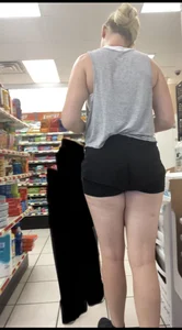 Blonde In Shorts Bending Over