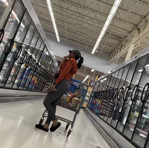 Ebony chick orange sweater + grey leggings