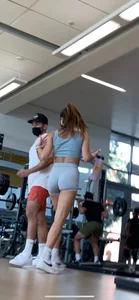 College gym slut in grey spandex shorts