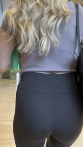 Blonde College Girl In Leggings Girl Keeps Touching Her Booty