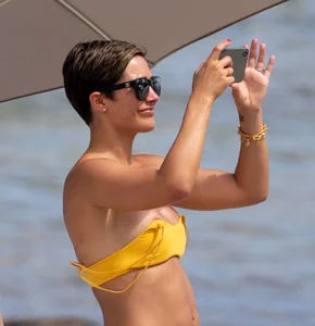 Frankie Bridge nip slips in a bikini on the beach