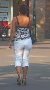 Street milf wearing white pants