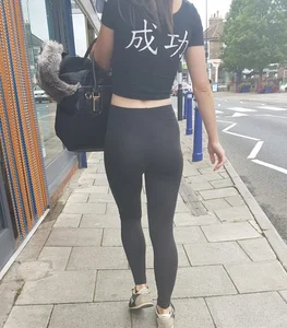 Sexy skinny brunette teen in see thru leggings with a black thong on