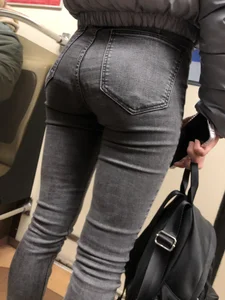 Candid girl with an incredible ass in grey jeans subway creepshots