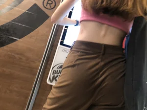 Extremely cute teen in a fast food restaurant