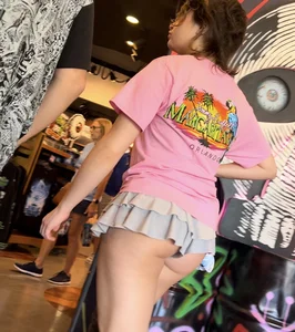 Petite light skin Latina with ass hanging out of skirty shorts
