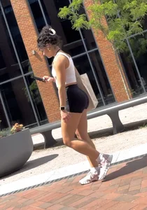 Curly Campus Brunette with amazing Bubble Butt in Tight Shorts (oc)