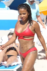 Christina Milian in red bikini in Miami with hard nipples