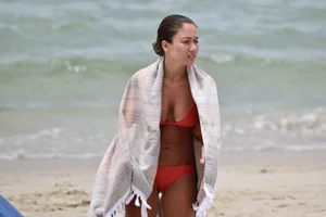 Two sexy ass girls on the beach in bikinis
