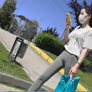 Girl in Tight Pants and a Mask Street Creepshot