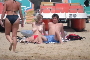 Girls on a nude beach in Bibione, Italy