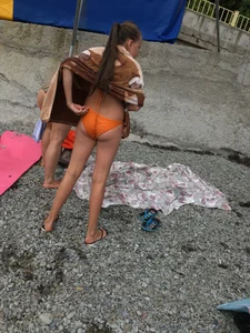 Girl in Orange Swimsuit Beach Candid