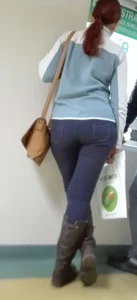 Wide ass on a redhead in tight jeans
