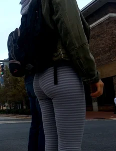 College girl in striped leggings walking with nice ass