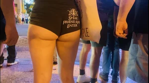 Cheeks hanging out black shorts