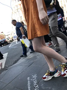 Cute Teen Girl in a Dress With Slim Legs Standing in the Subway Train, Then Crossing the Street Photo Gallery
