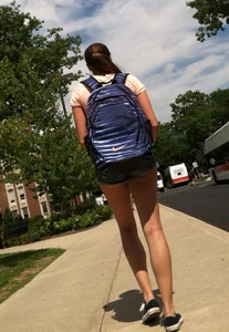 Hot college girl in little jean shorts showing some cheeks and legs