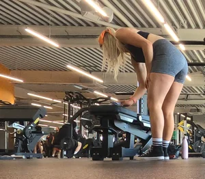 Cute gym blonde with orange hair ribbon