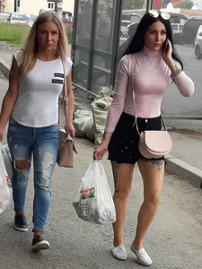 Girl with Tattooed Legs in a Skirt Street Candid Pic