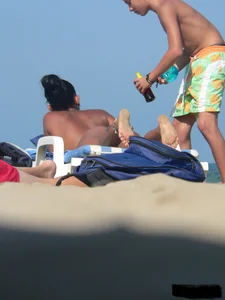 Hot ass topless beach girl with great tits lets her little brother oil up her ass in thong bikini