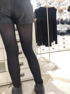 Shop Assistant's Flat Booty in Leather Shorts And Legs in Black Pantyhose Store Creepshots Gallery
