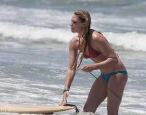 Candid surfer babes on the beach and in bikinis