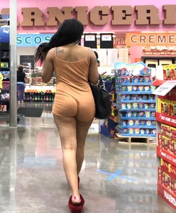 Latina with hard nipples and a big booty in tight spandex shorts outfit