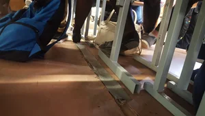 College Teen's Legs in Dark Pantyhose And Feet in Flats Classroom Under Desk Creepshots