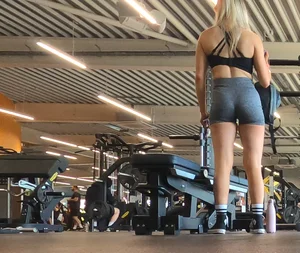 Cute gym blonde with orange hair ribbon