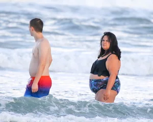 Extra thick girl at the beach in a bikini
