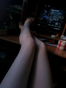 Gamer Girl Home Selfie with Her Legs on Table