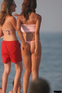 A bunch of sexy beach voyeur babes in bikinis, thongs and topless