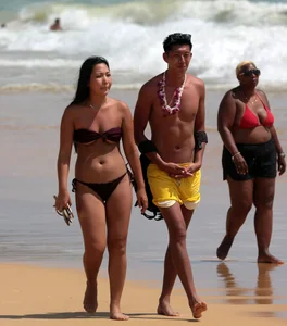 Sexy Asian on the beach with nice boobs and ass