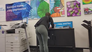 Green Lululemons Bent Over at Fedex