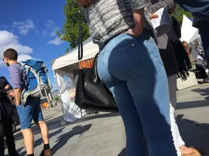Bubble ass closeup in tight blue jeans street creepshots