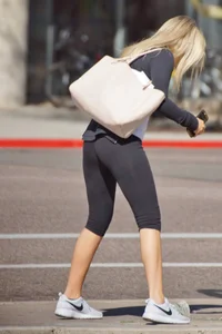 Skinny Blonde in Short Tights Bending Over on the Street to Pick Up Something on the Ground Sexy Candid Photos