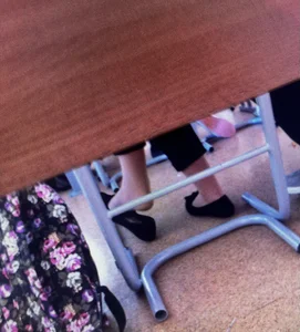 College candid teens' flats under desk, dangle creepshots