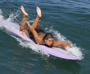Candid surfer babes on the beach and in bikinis