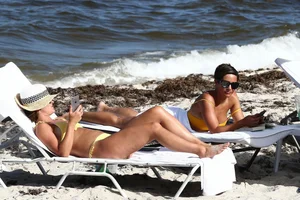 Frankie Bridge nip slips in a bikini on the beach