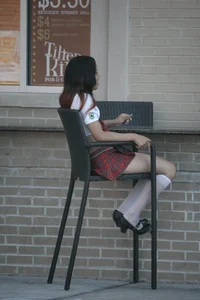 Two sexy Tilted Kilt employees showing cleavage and cheeks